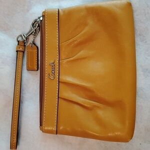 Coach Pleated Leather Wristlet in Saffron